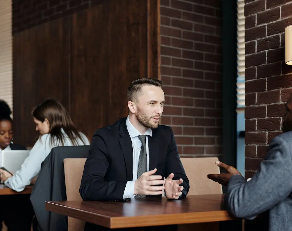 an attorney discussing with a client