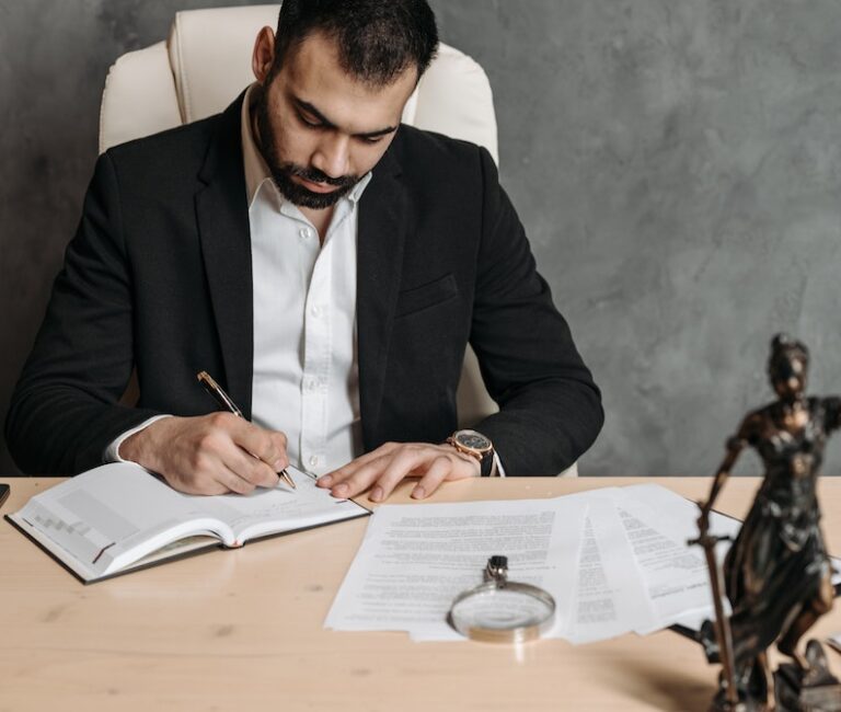 an attorney evaluating client documents in preparation to file a claim